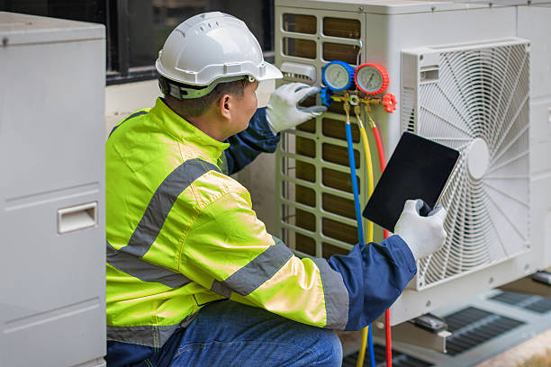 Professional Air Conditioning Repair technician working in Russell, IL
